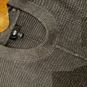 Women’s grey and silver sweater